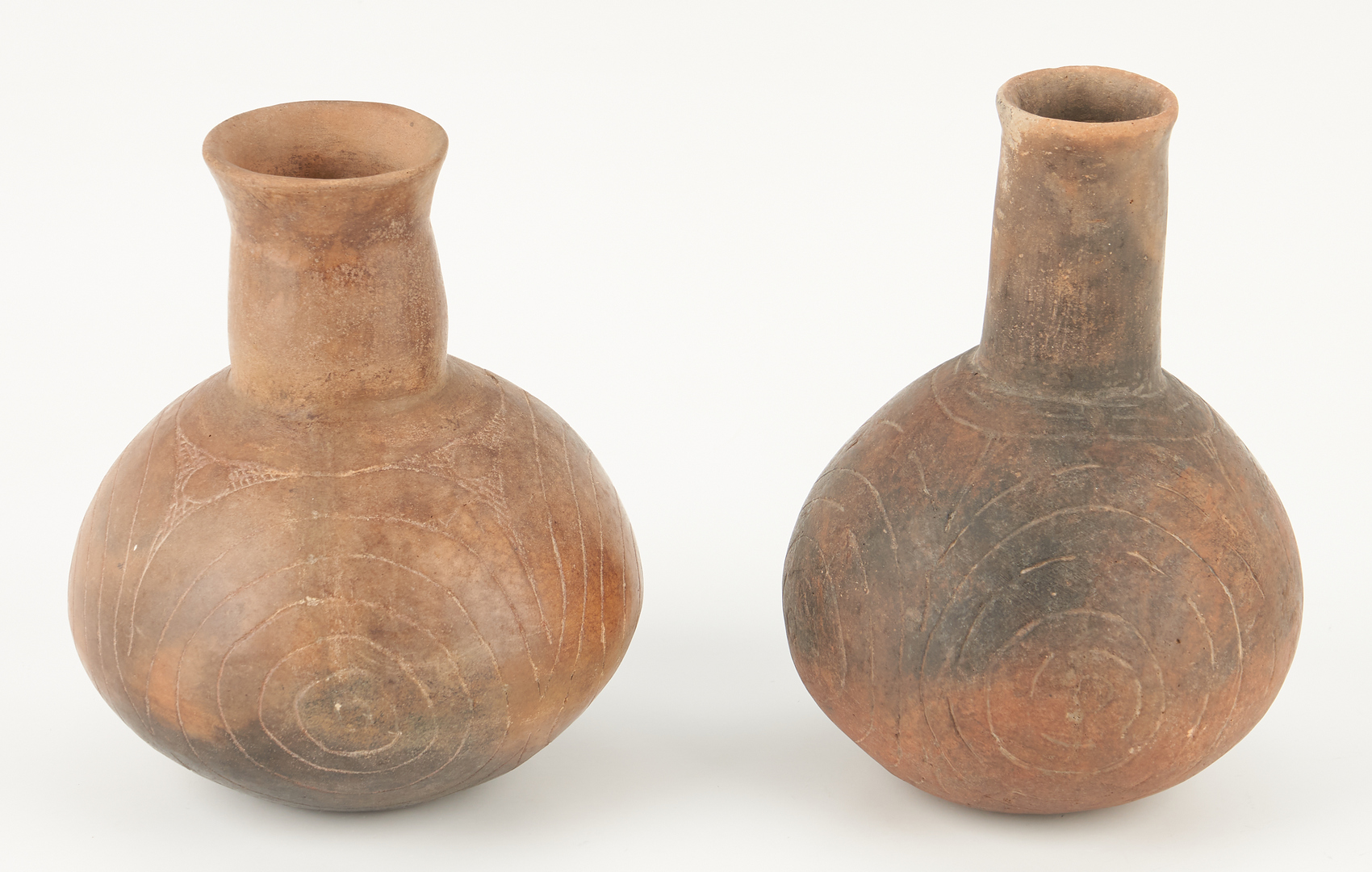 Lot 683: 2 Native American Caddo Culture Engraved Bottles