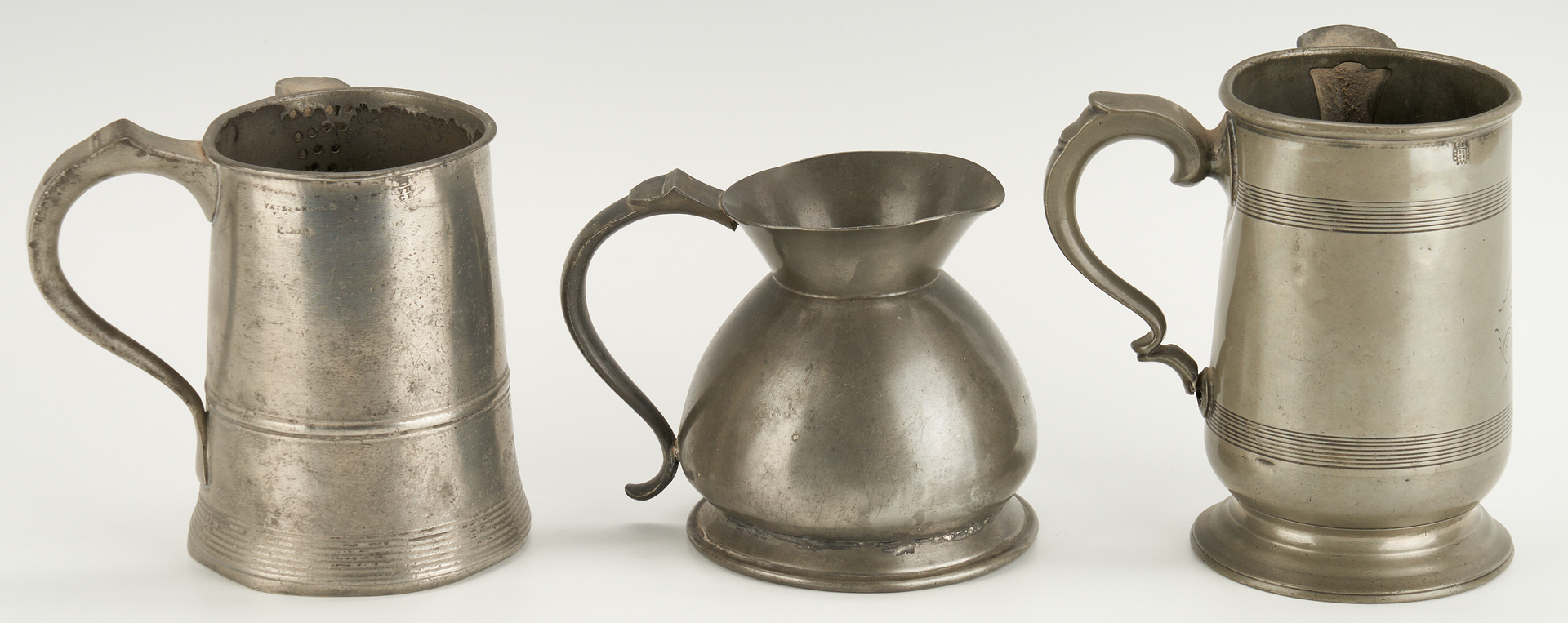 Lot 275: 11 Pcs. Pewter Flagons, Tankards, Jugs and Measures