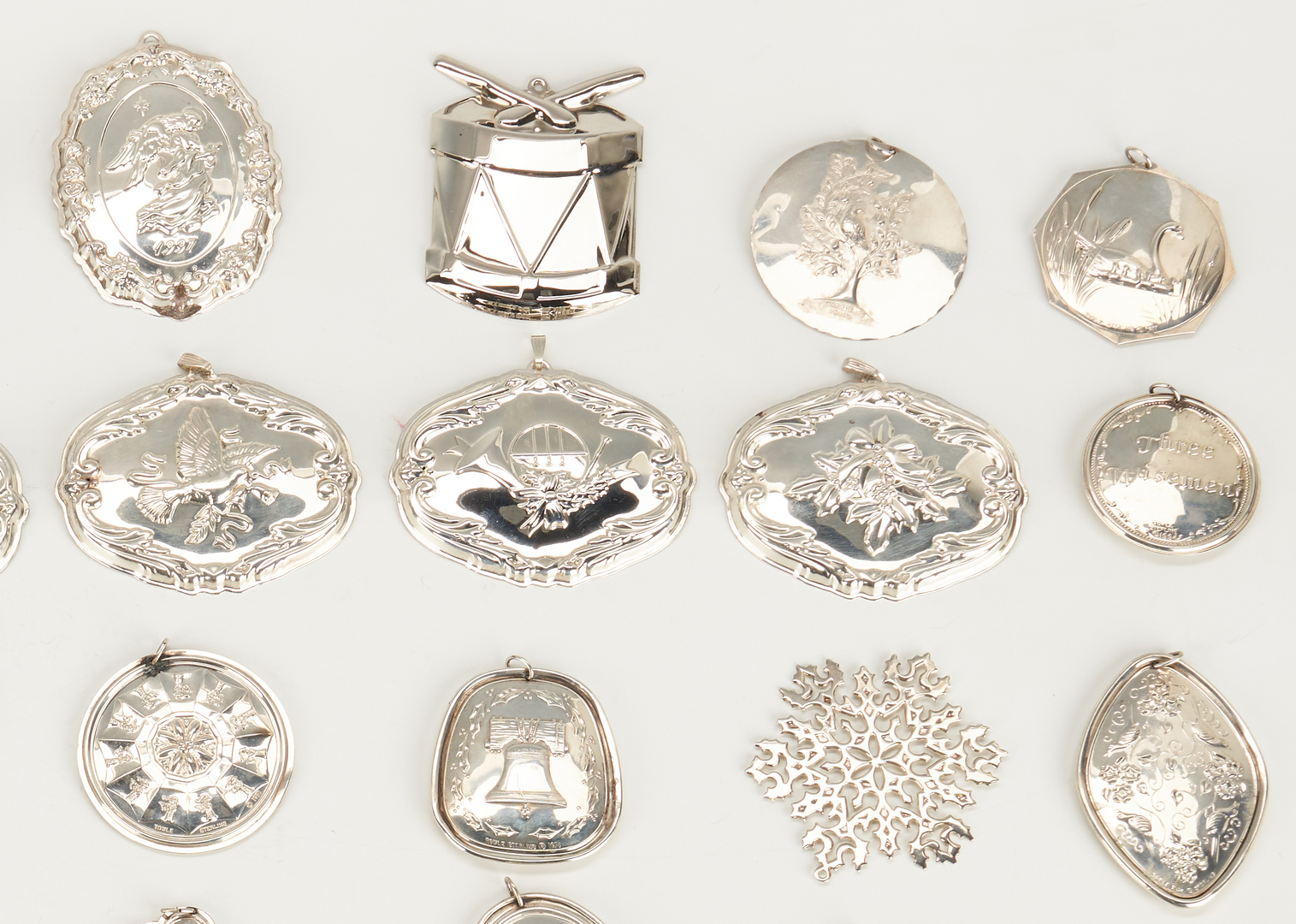 Lot 285: 45 Sterling Christmas Ornaments by Tiffany, Reed & Barton, Towle