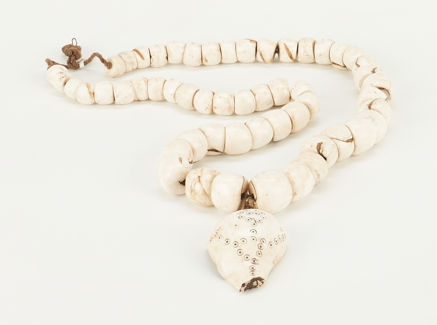 Lot 309: Burmese Naga Conch Fossil Necklace & Asian Prayer Bead Necklace
