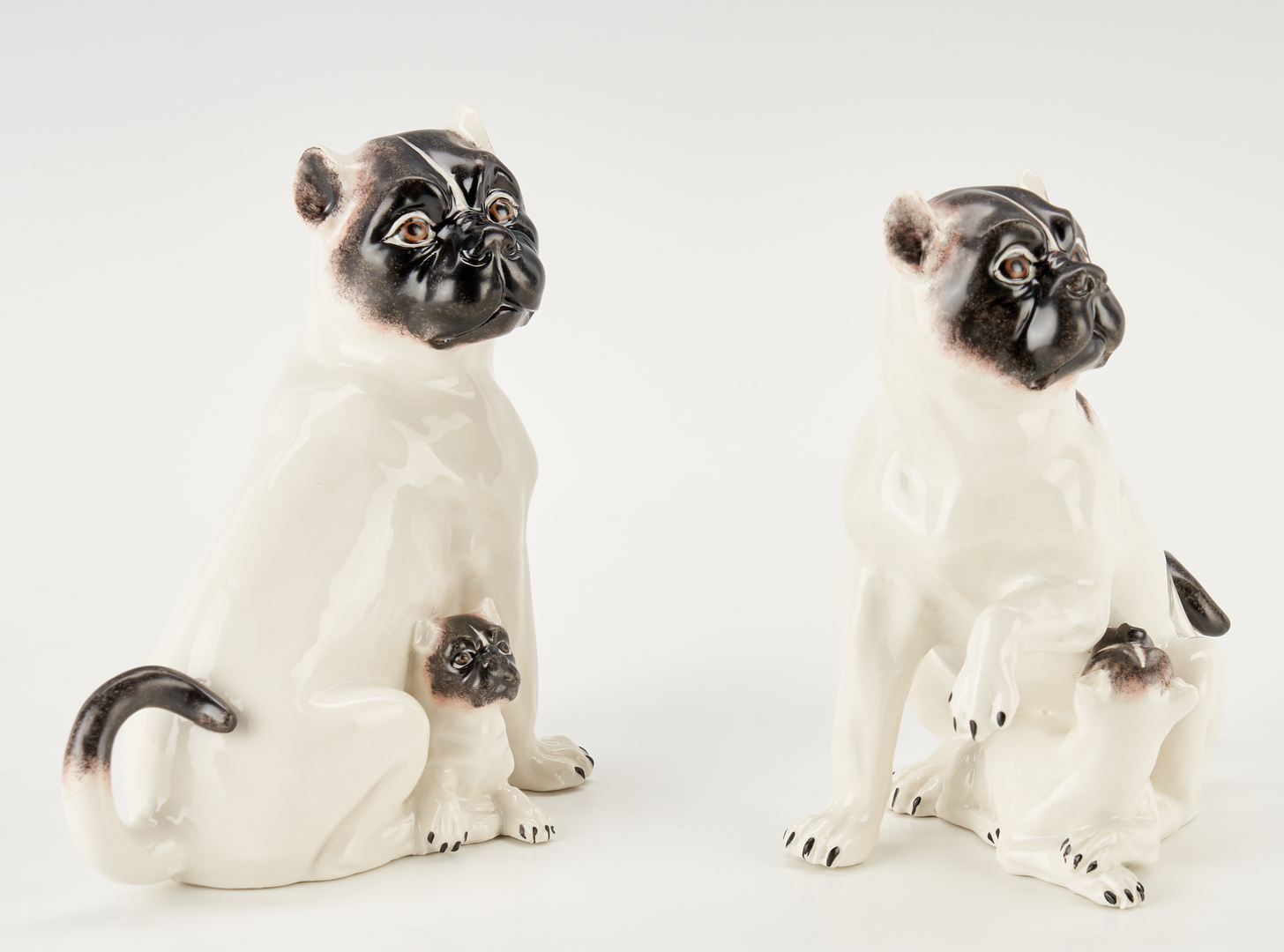 Lot 461: Pair of Chelsea House Porcelain Pug Figurines