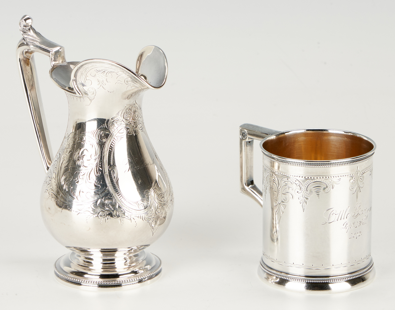 Lot 104: 16 Coin & Sterling Silver Items, incl. Medallion Ladle & Creamer