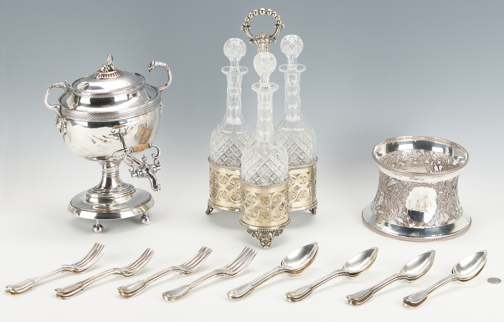 Lot 1168: Silverplated Urn, Bottle Stand, Dish Ring & Christofle Flatware