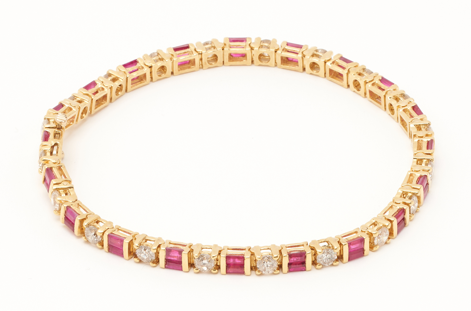 Lot 379: Ruby & Diamond Tennis Bracelet