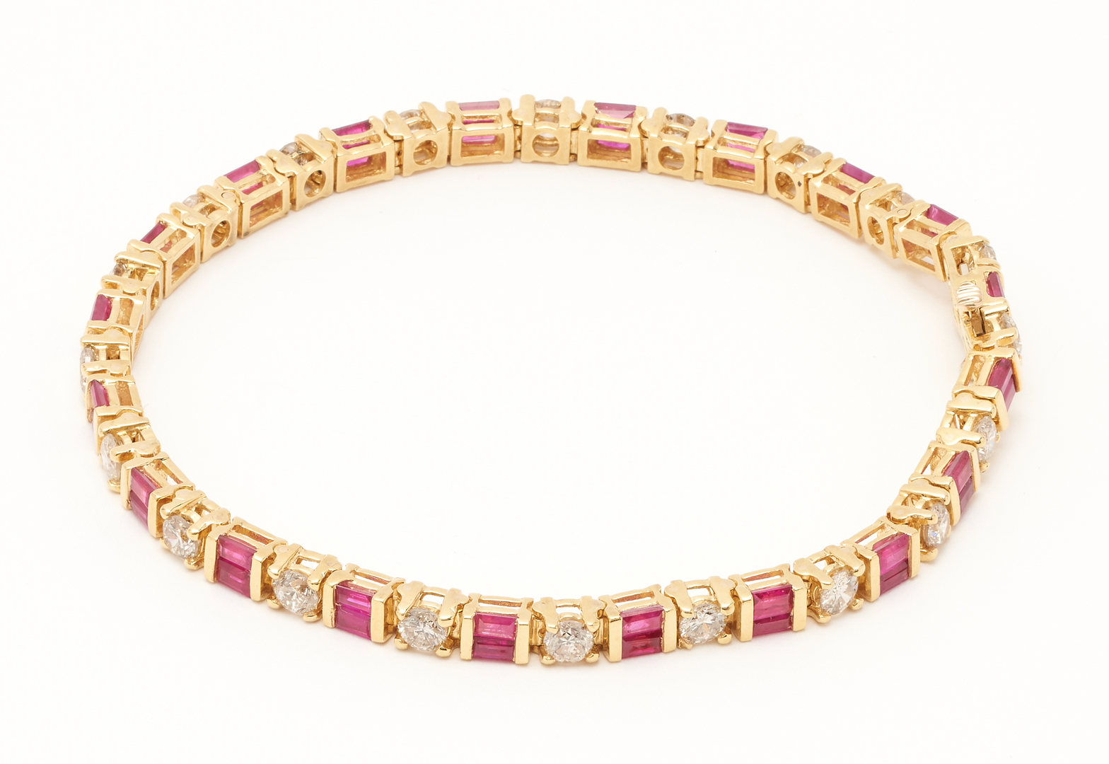 Lot 379: Ruby & Diamond Tennis Bracelet