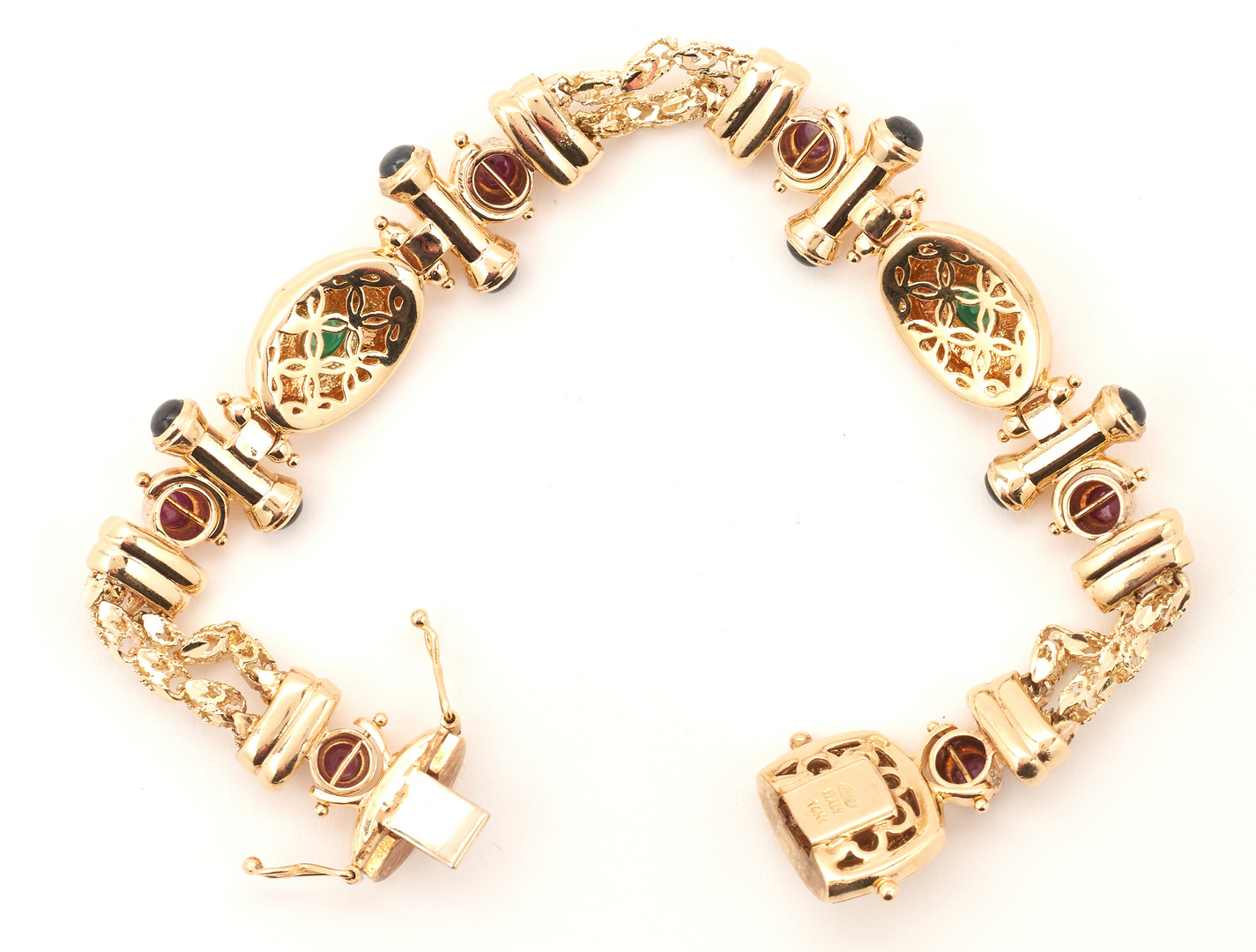 Lot 396: Emerald, Ruby, & Sapphire Bracelet