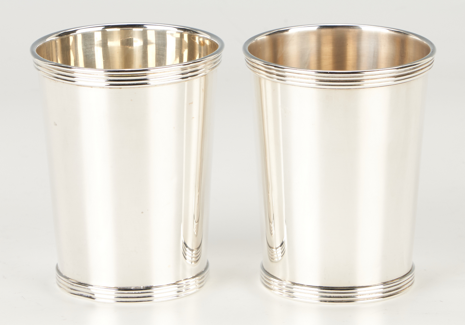 Lot 430: 12 Sterling Silver Julep Cups, incl. Rogers & International