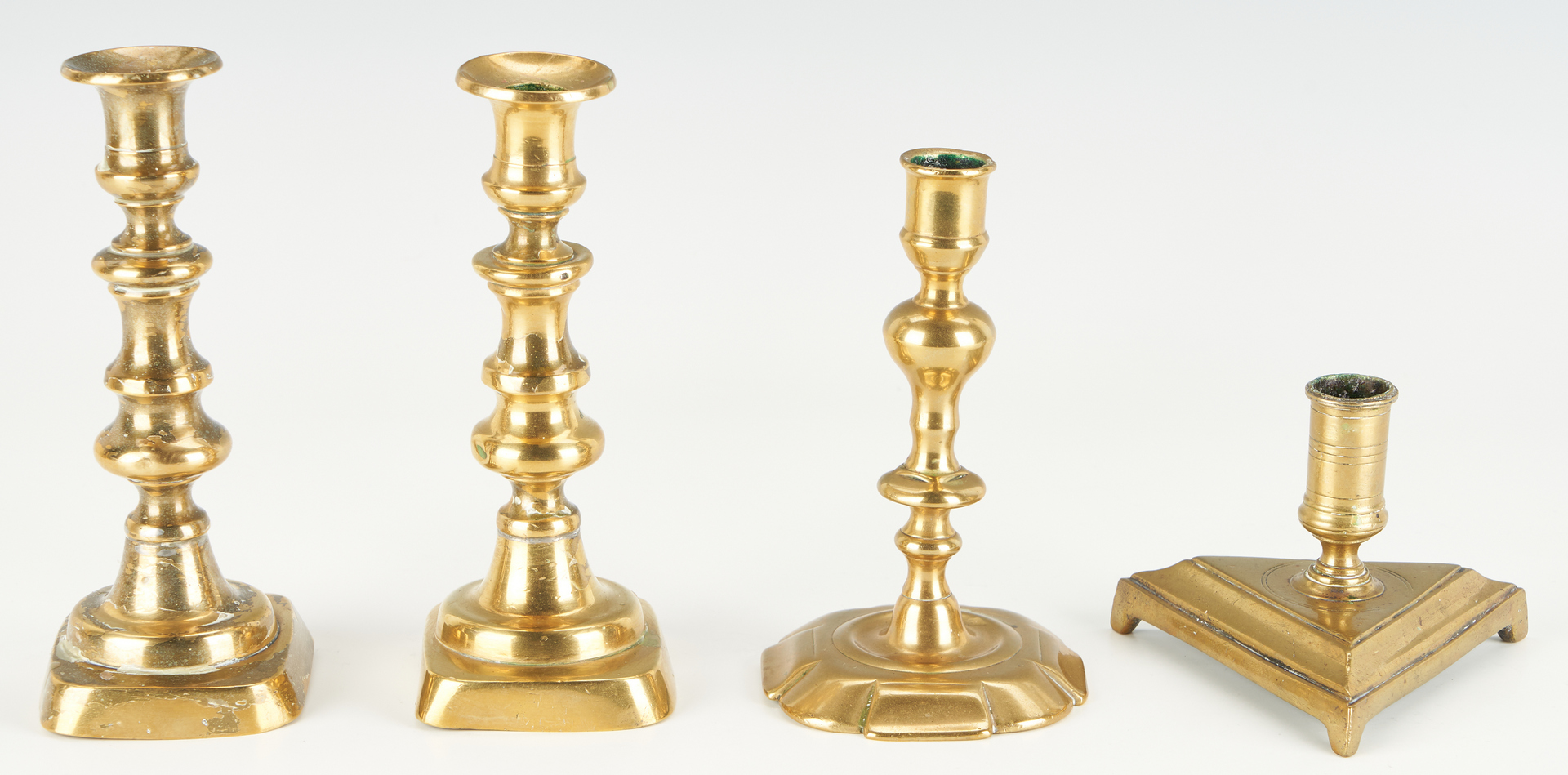 Lot 452: Collection of 10 Antique Brass Candlesticks