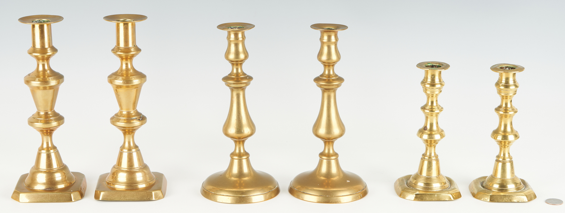 Lot 452: Collection of 10 Antique Brass Candlesticks