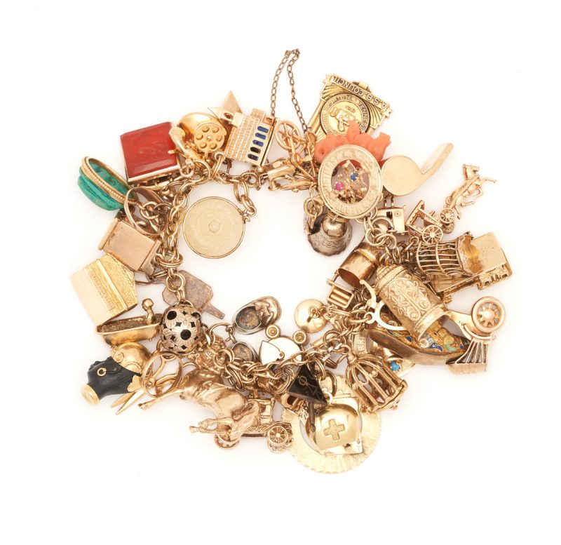 Lot 54: Ladies 14K Charm Bracelet, 47 charms