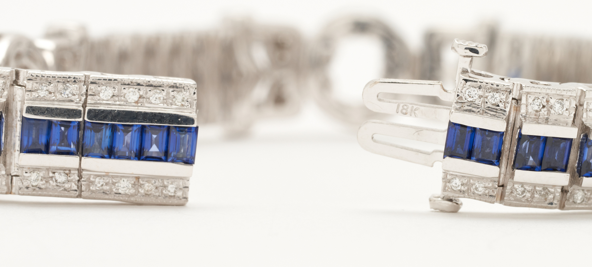 Lot 56: 18K Sapphire & Diamond Bracelet
