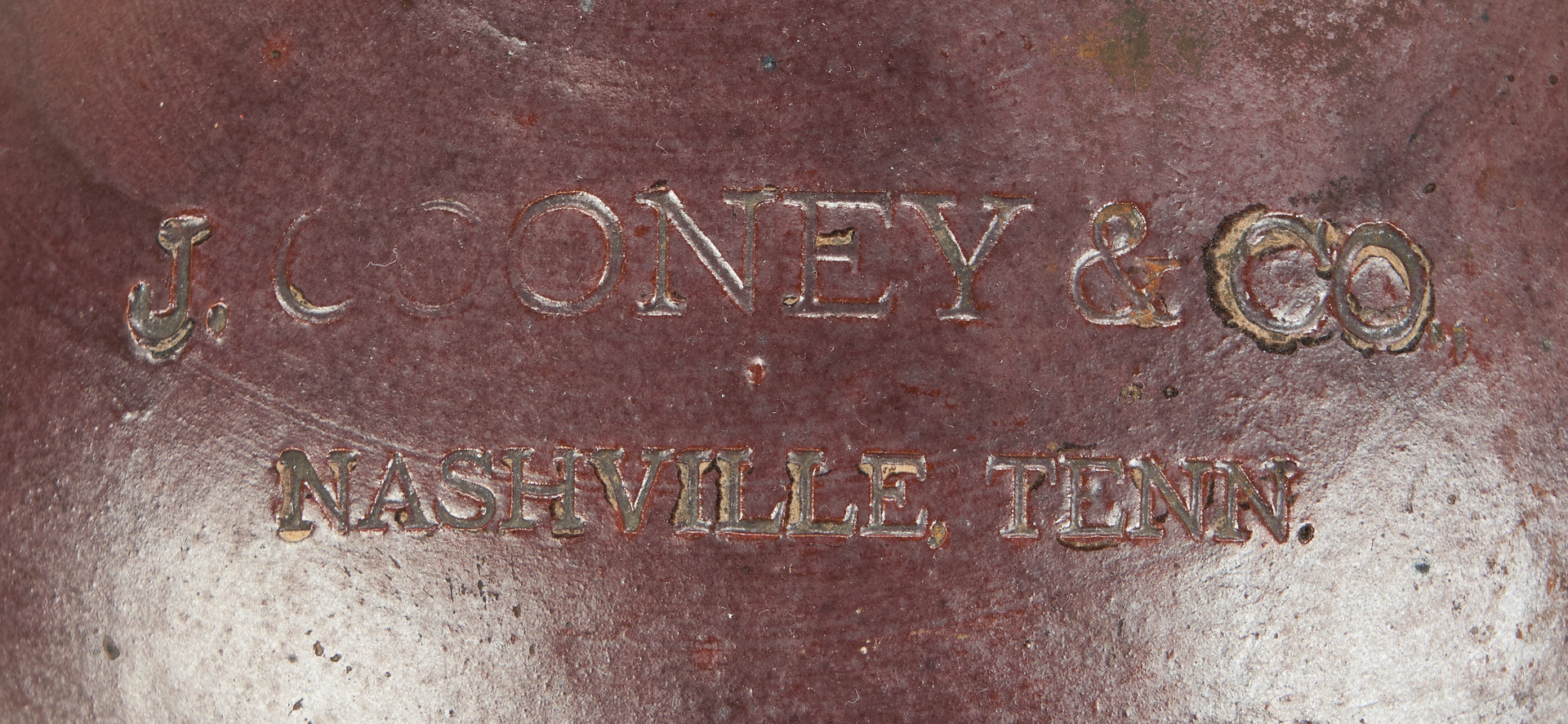 Lot 706: Four (4) Nashville Stoneware Pottery Whiskey Jugs