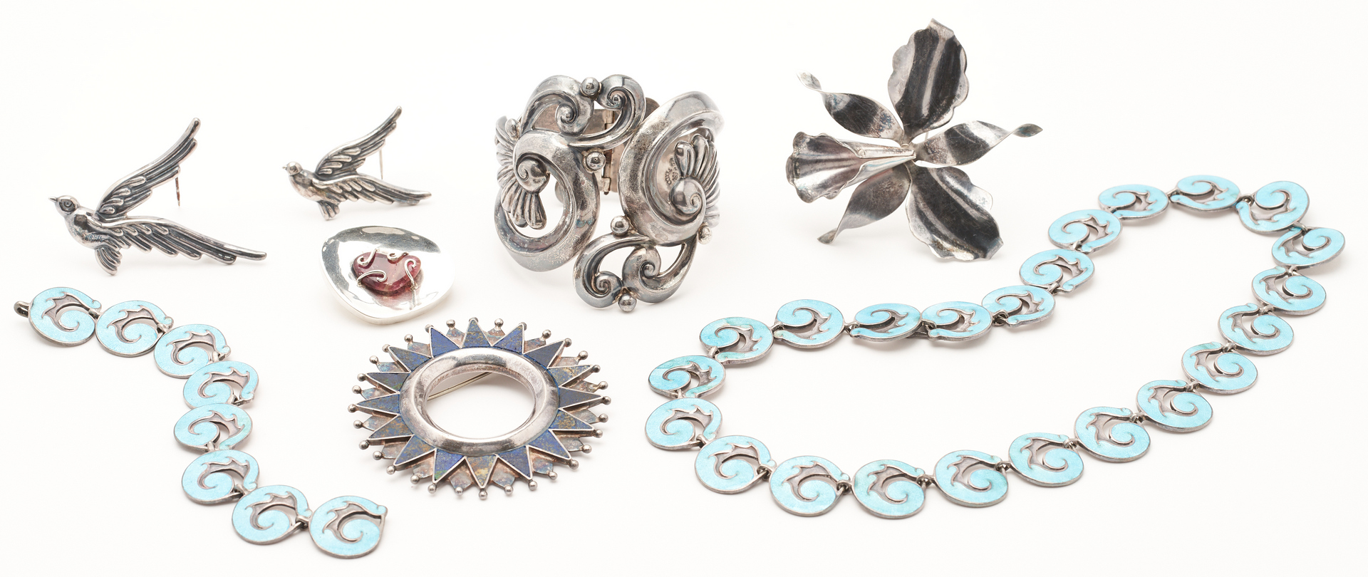 Lot 838: Eight (8) Mexican Designer Sterling Silver Jewelry Items