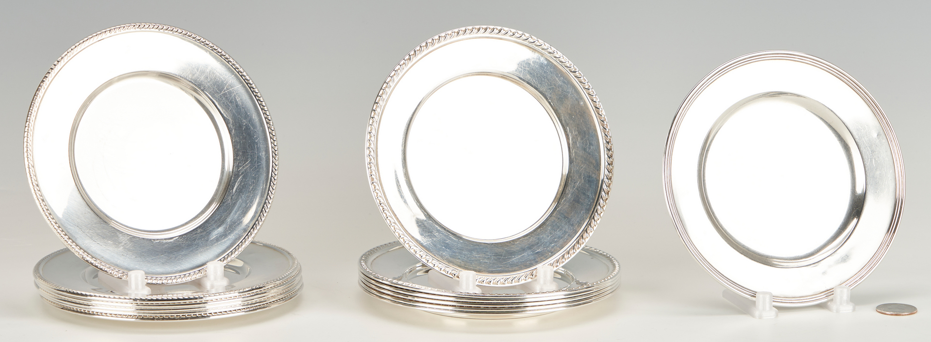 Lot 1227: 13 Sterling Silver Bread Plates, Fina and Amston