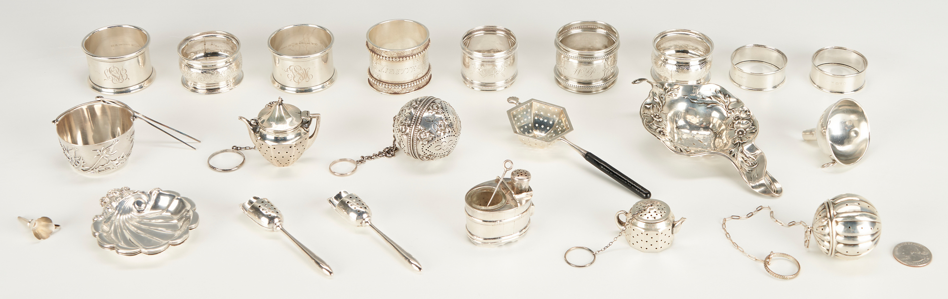 Lot 1251: 25 Asst. Sterling Silver Items, incl. Tea Strainers & Napkin Rings