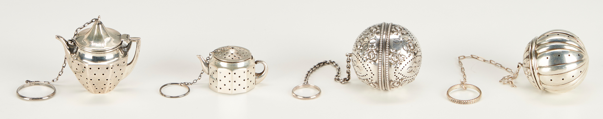 Lot 1251: 25 Asst. Sterling Silver Items, incl. Tea Strainers & Napkin Rings