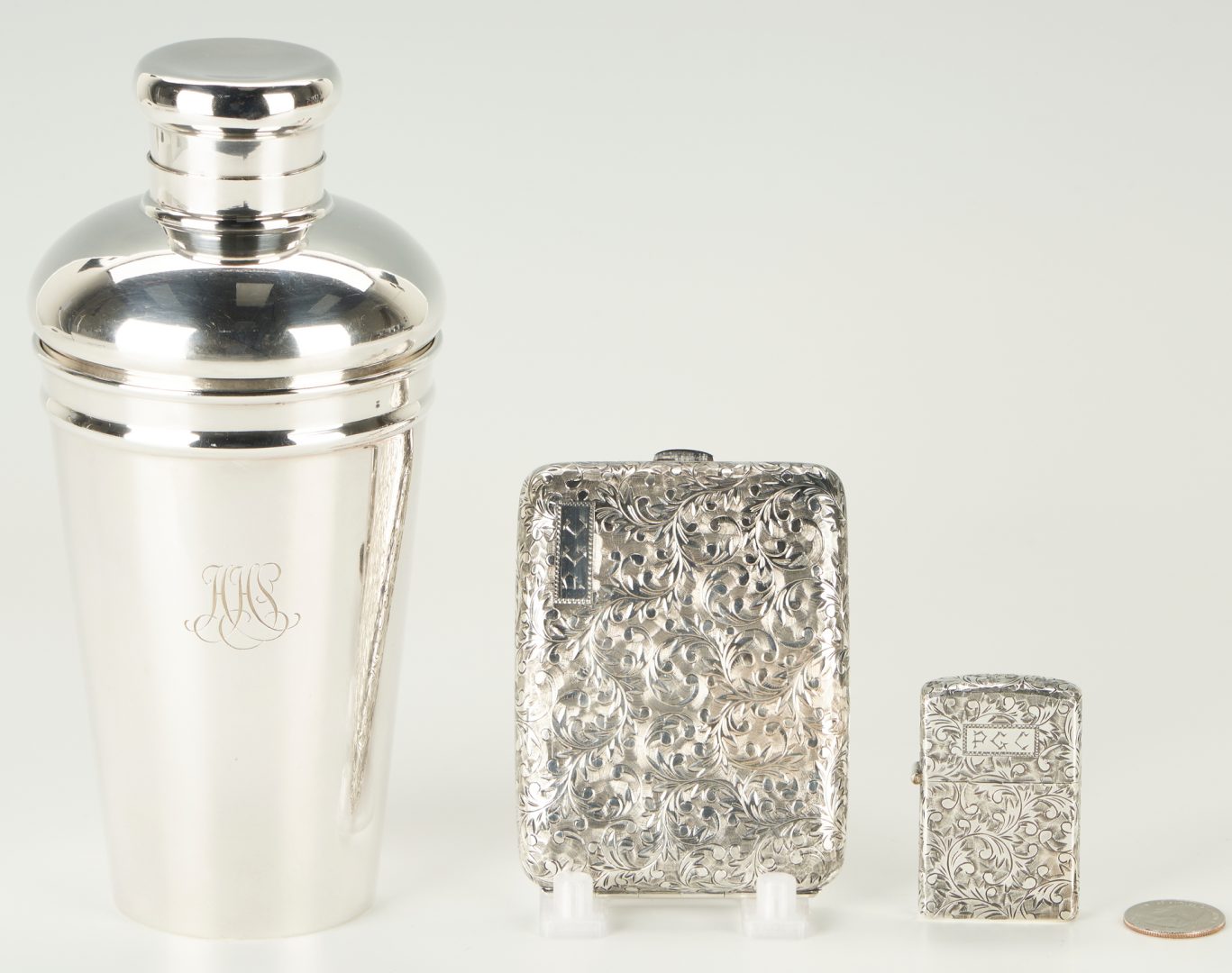 Lot 1253: Tiffany & Co. Silver Cocktail Shaker + Sterling Cigarette Case & Lighter, 3 items