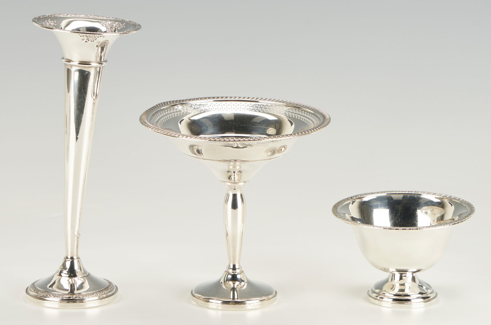 Lot 1259: 12 pc Weighted Sterling Silver, Candelabras, Candlesticks, Compotes