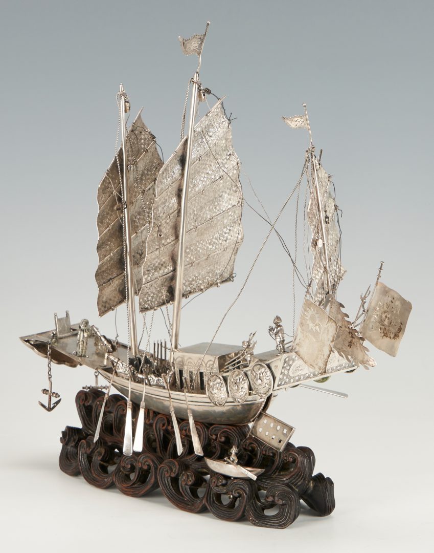 Lot 2: Large Chinese Export Silver Model of a Ship and Rowboat, Carved Stand Simulating Waves