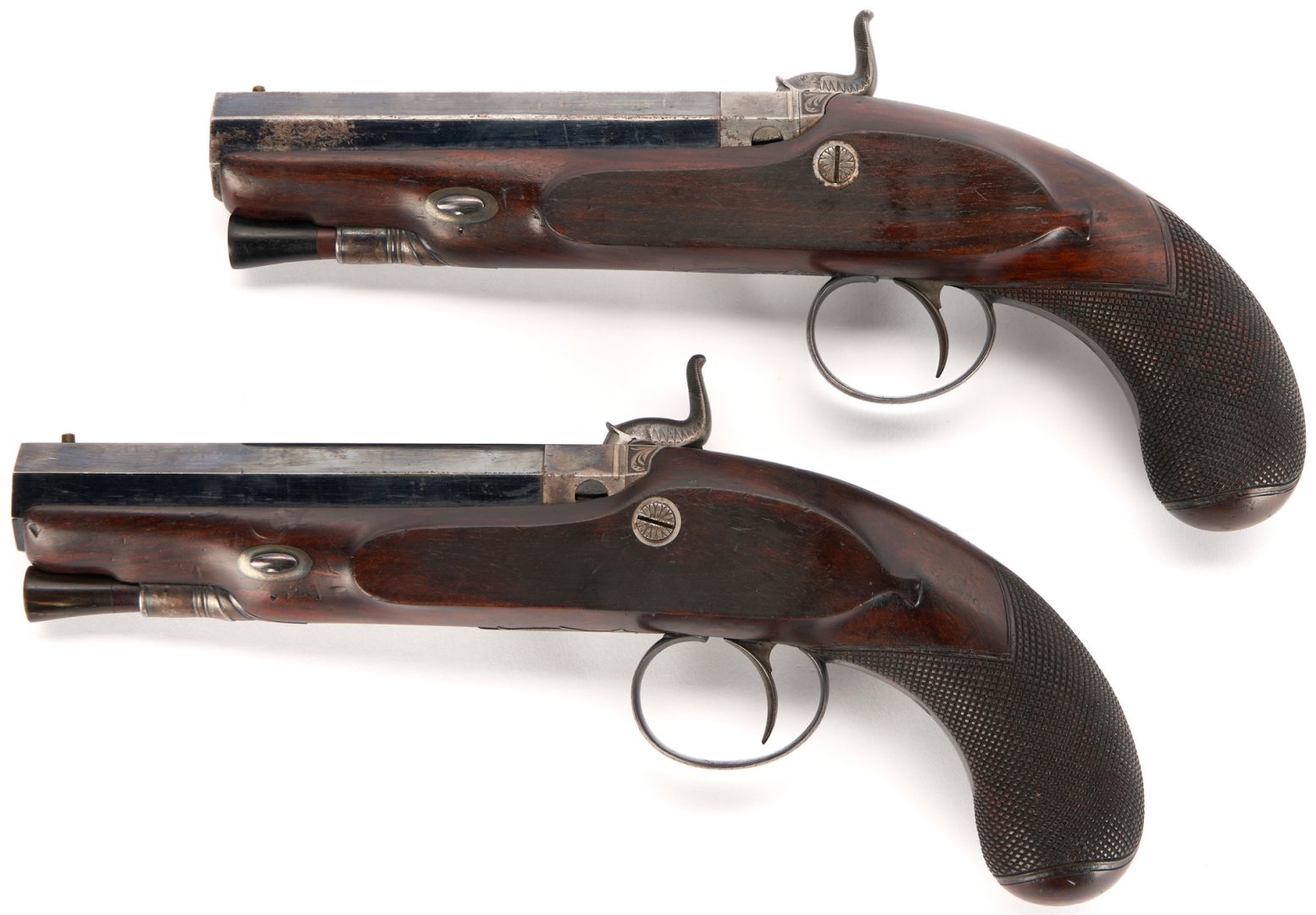 Lot 668: Pair of Cased John Manton & Son Dueling Pistols, .63 cal.