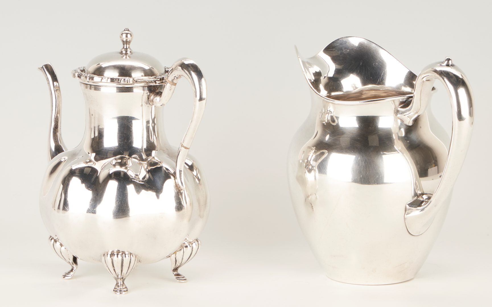 Lot 764: Whiting Sterling Water Pitcher and Mexican Sterling Teapot