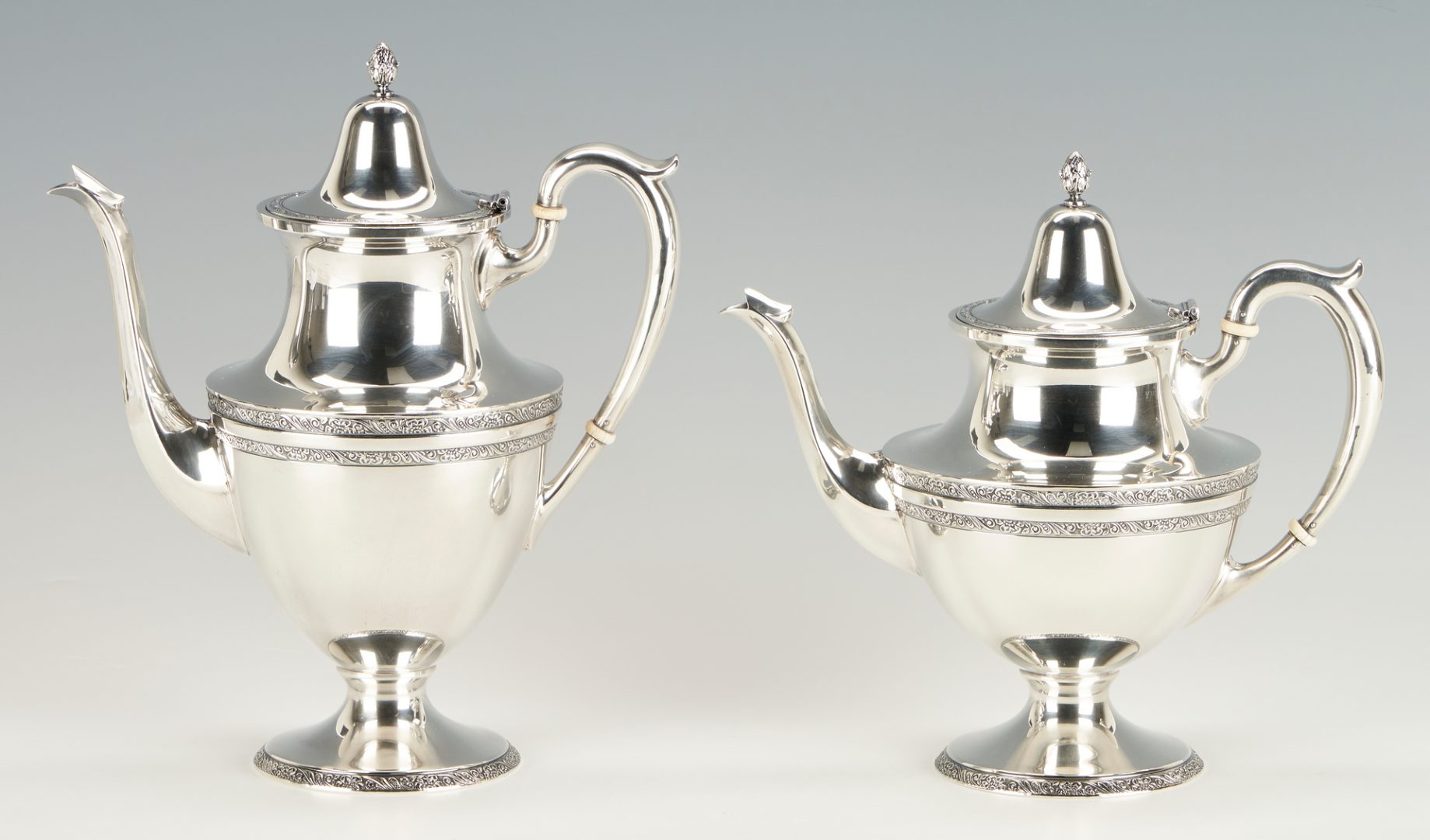 Lot 767: M. Fred Hirsch Sterling Coffeepot & Teapot, 2 pcs.