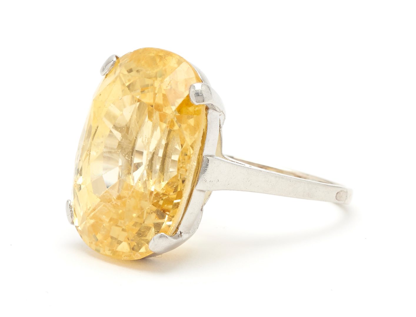 Lot 843: Platinum Yellow Sapphire Ring