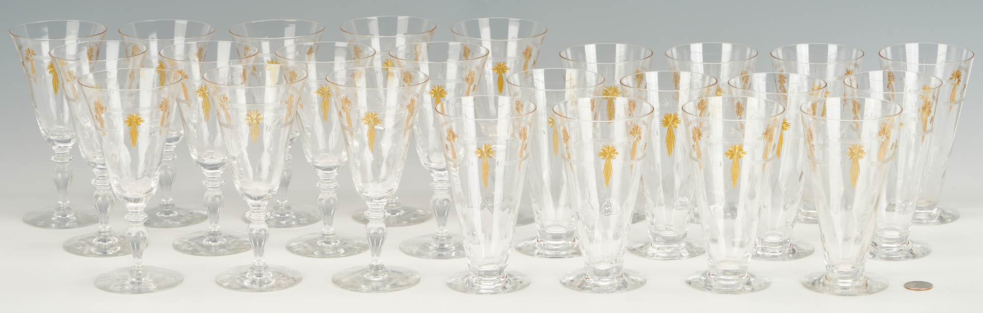 Lot 967: 69 Signed Hawkes Amber Star Glass Stemware Pieces