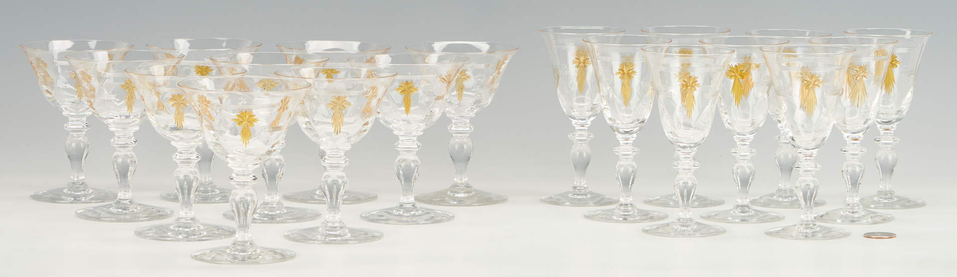 Lot 967: 69 Signed Hawkes Amber Star Glass Stemware Pieces