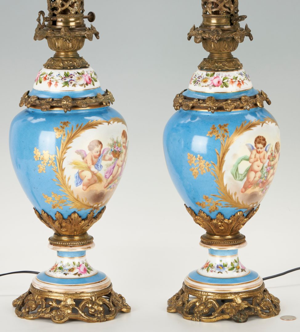 Lot 180: Pair of French Porcelain Ormolu Mounted Lamps