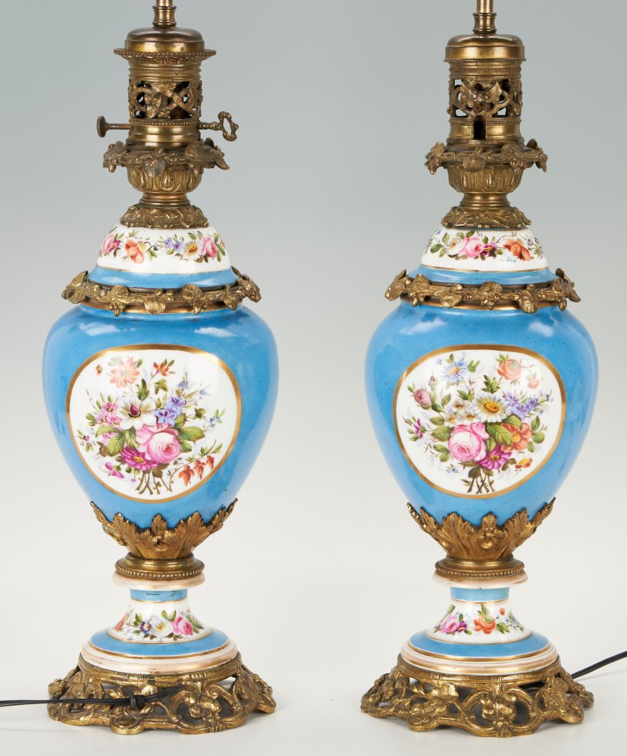 Lot 180: Pair of French Porcelain Ormolu Mounted Lamps