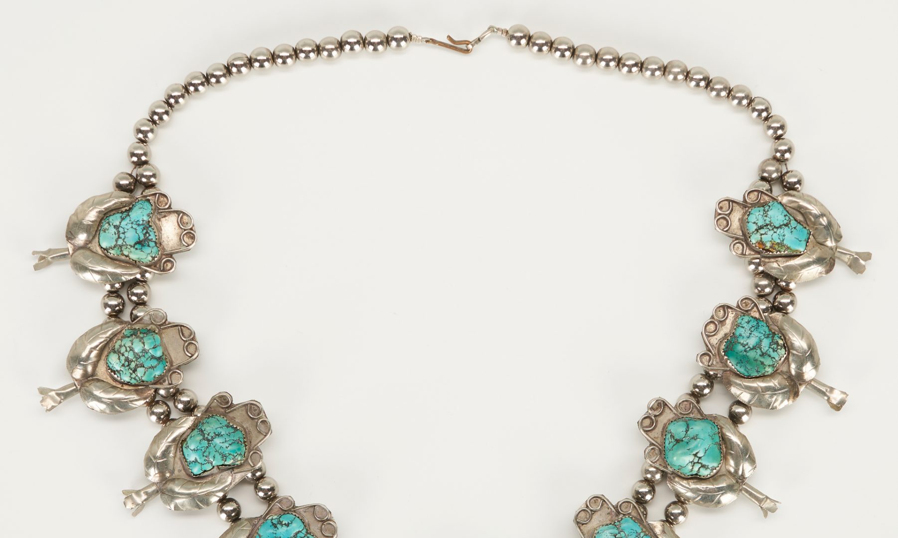 Lot 487: Navajo Turquoise & Silver Squash Blossom Necklace