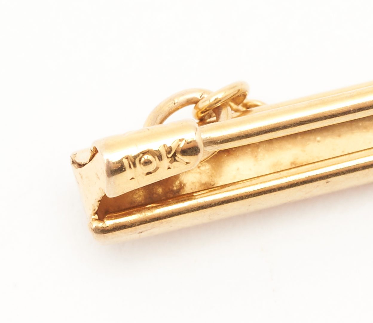 Lot 548: 14K Gold Tie Clip, 10K Tie Tack, & 10K 1945 Class Ring, 3 items