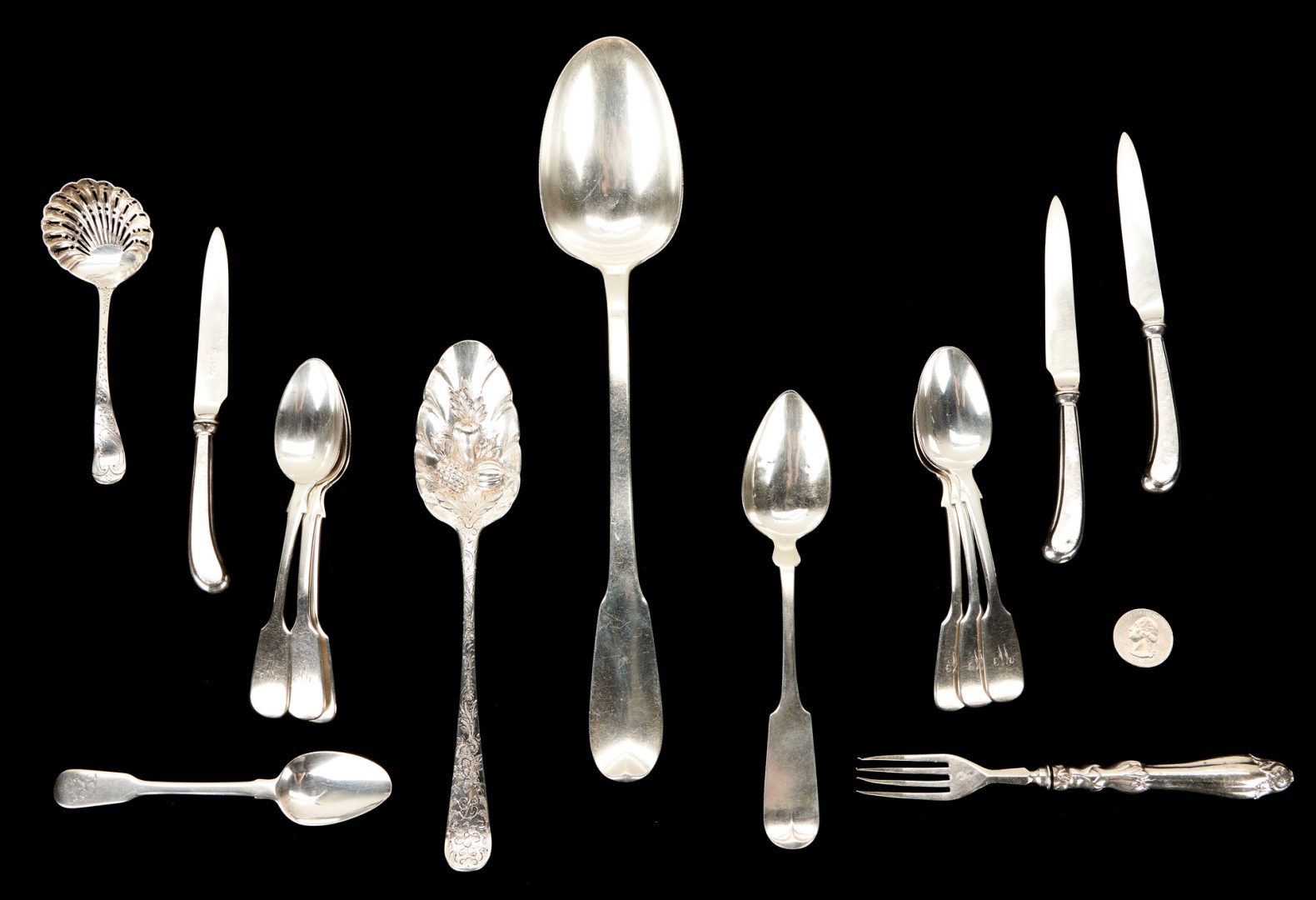 Lot 56: 17 Pcs. English Sterling Silver, incl. Sugar, Creamer and Stuffing Spoon