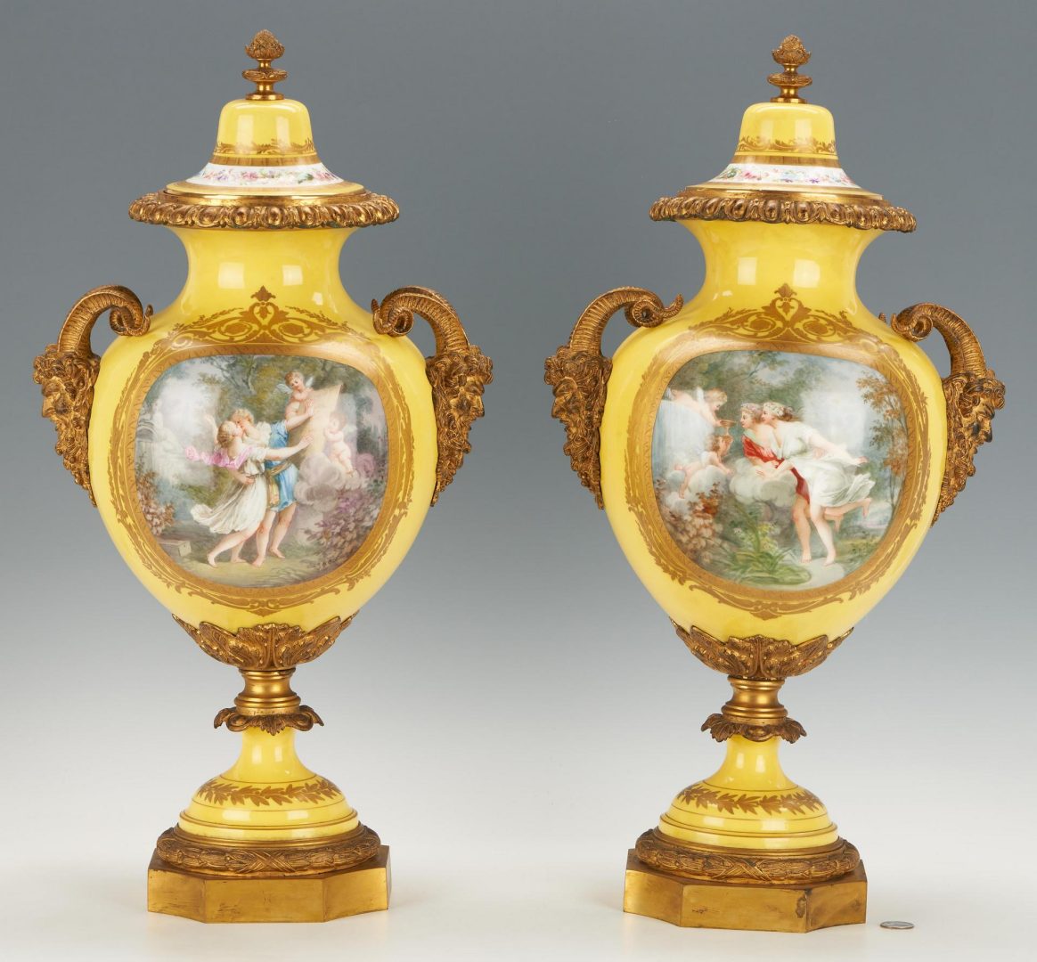 Lot 77: Large Pair of Sevres Style Bronze Mounted Decorated Porcelain Urns