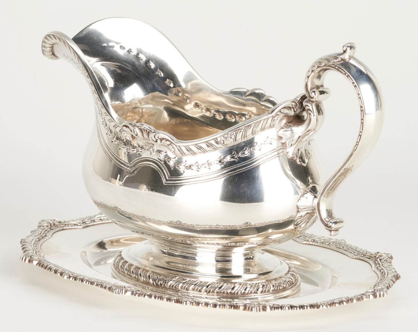 Lot 1009: 6 Sterling Table Items incl. Tiffany & Co. Revere Bowl, Gorham Gravy Boat Set