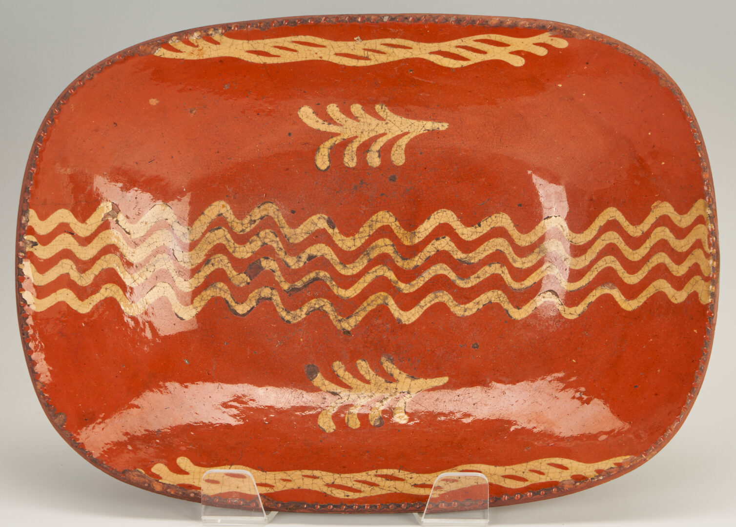 Lot 207: Collection of 7 Slipware Decorated Redware Plates