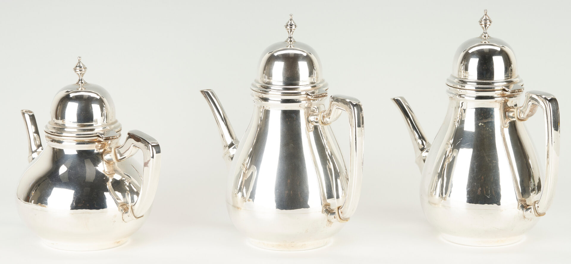 Lot 353: 7 Pcs. Sterling Hollowware Incl. Tea Set, Tiffany Dresser Set, Garrard & Co. Wine Goblet