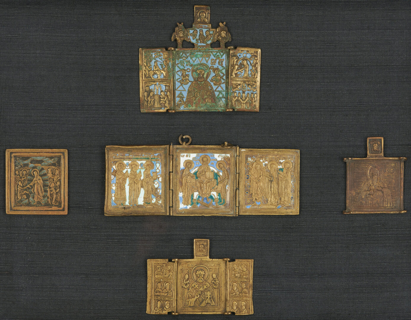 Lot 386: 12 Brass Russian Traveling Icons in 2 Framed Groupings