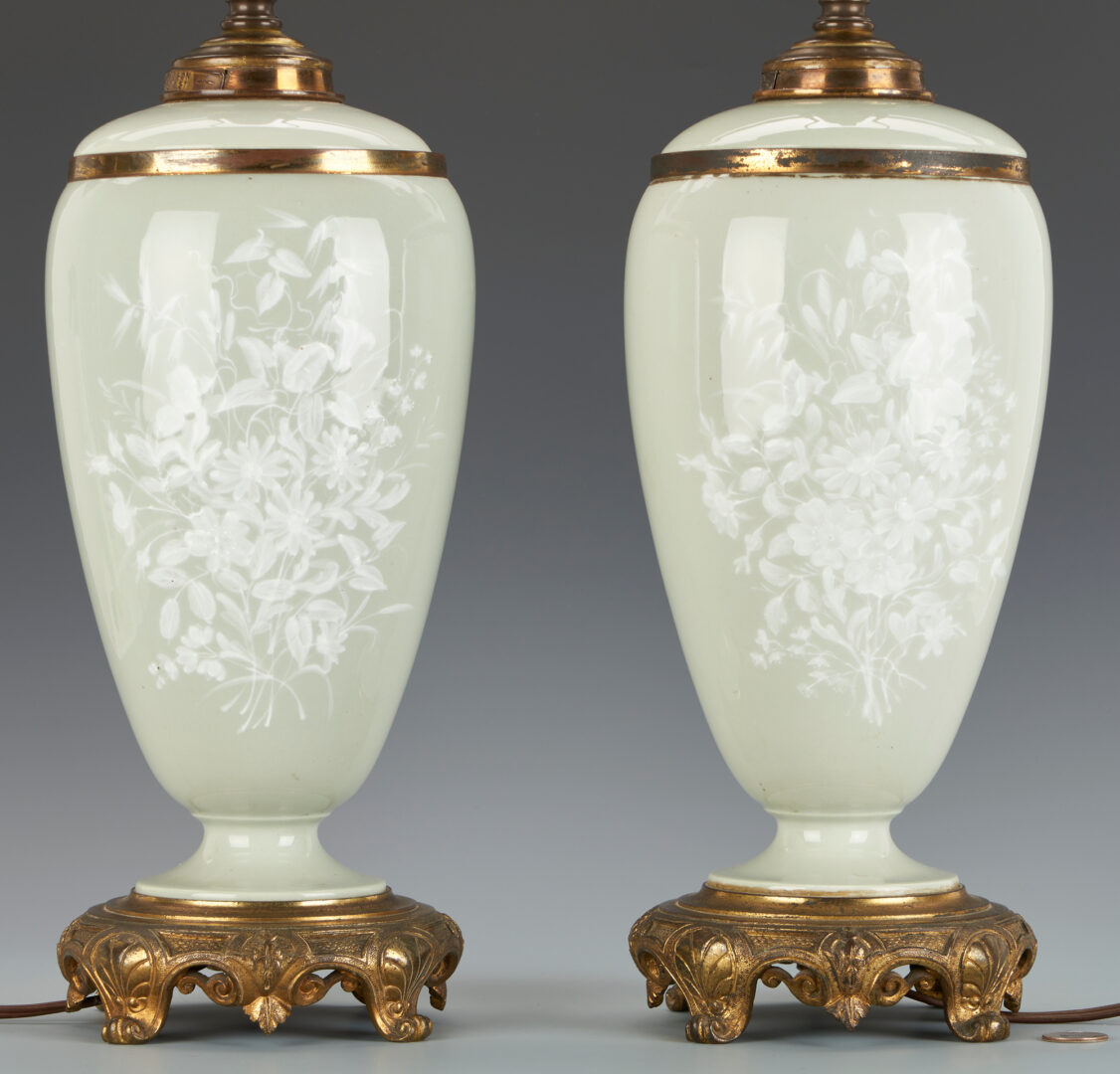 Lot 486: Pr. Pate-Sur-Pate Gilt Mounted Celadon Porcelain Lamps