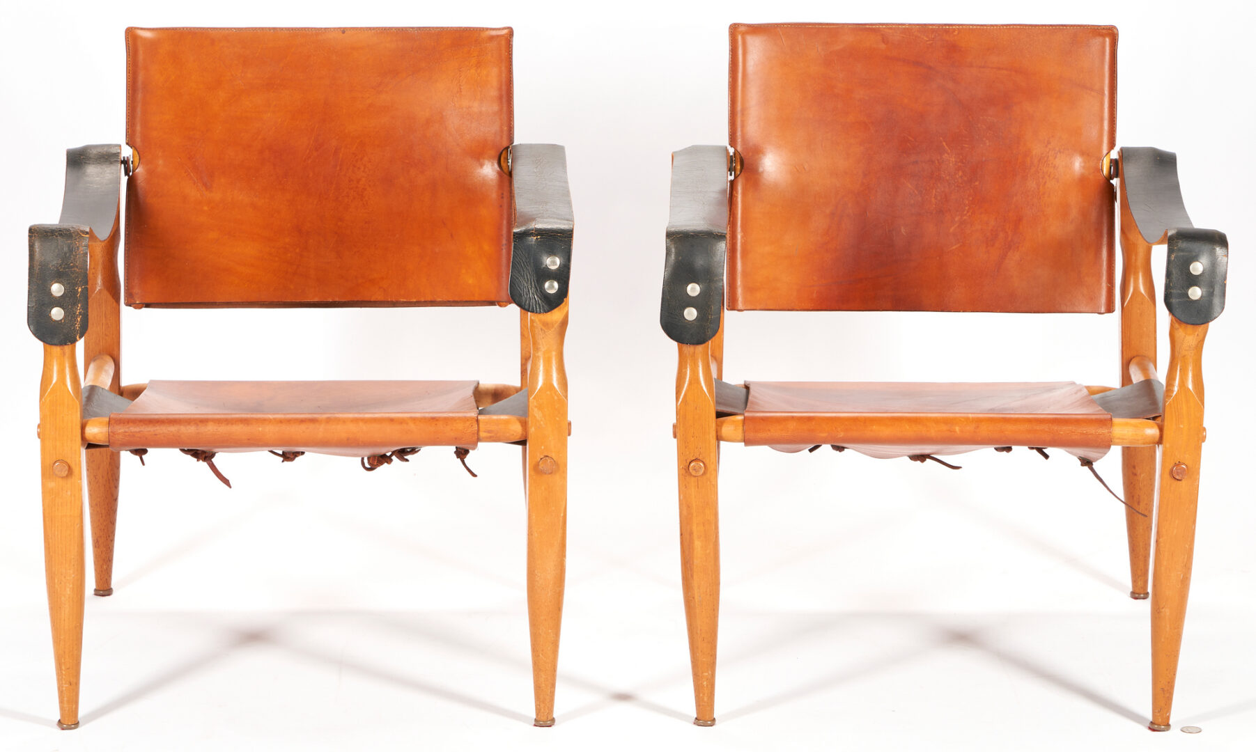 Lot 530: Pair Mid Century Leather Safari Chairs