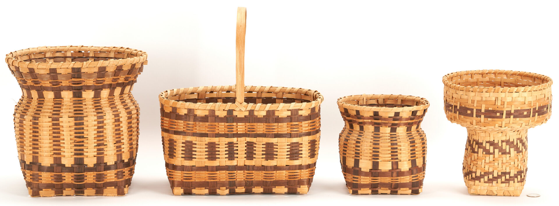 Lot 610: Four (4) Cherokee Native American Signed Baskets by Agnes Welch