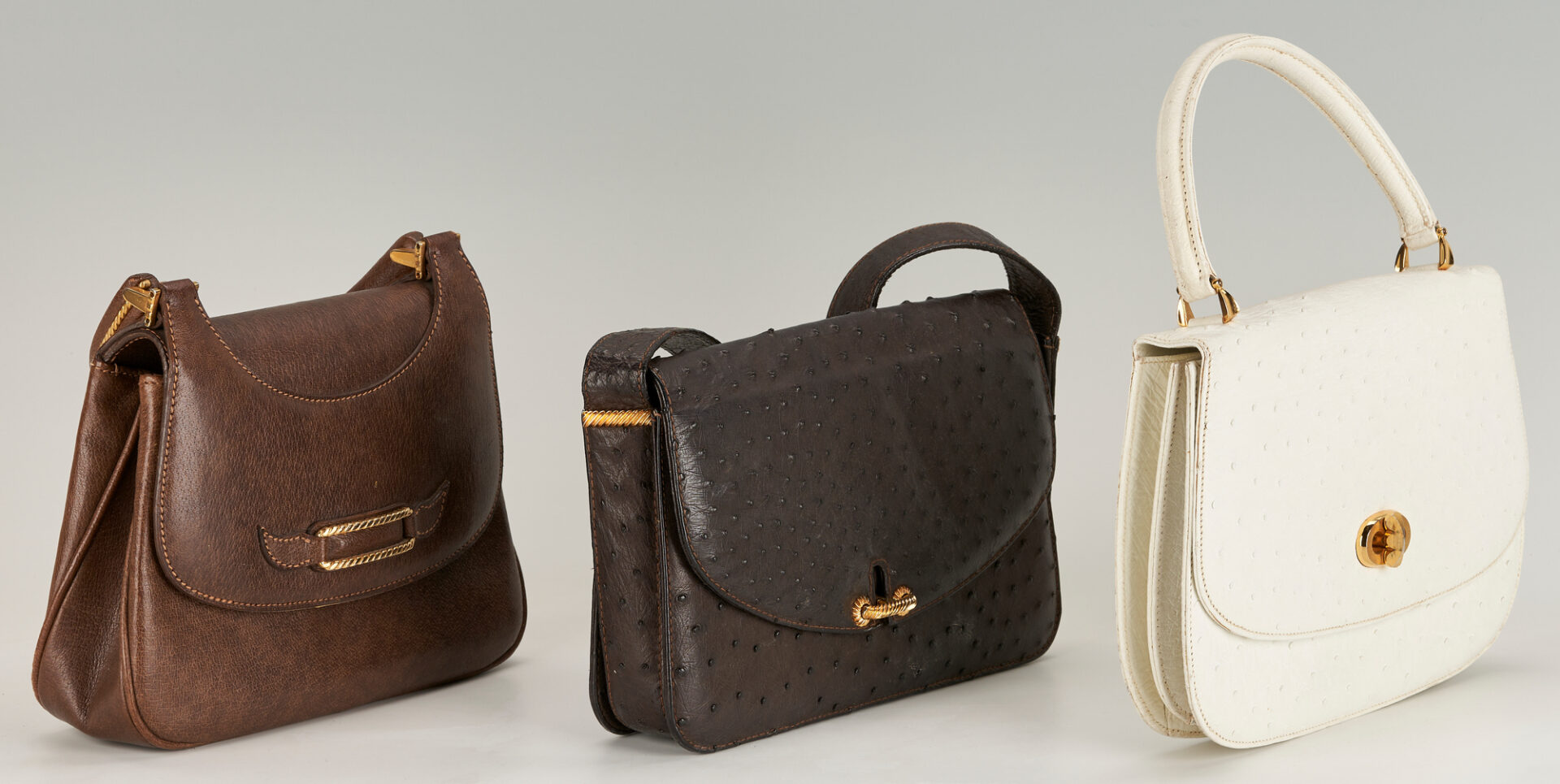 Lot 749: 3 Gucci Handbags, including Ostrich, Leather