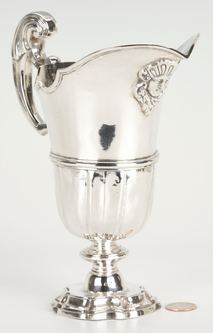 Lot 802: Small Sterling Pitcher with Mask, possibly S. American