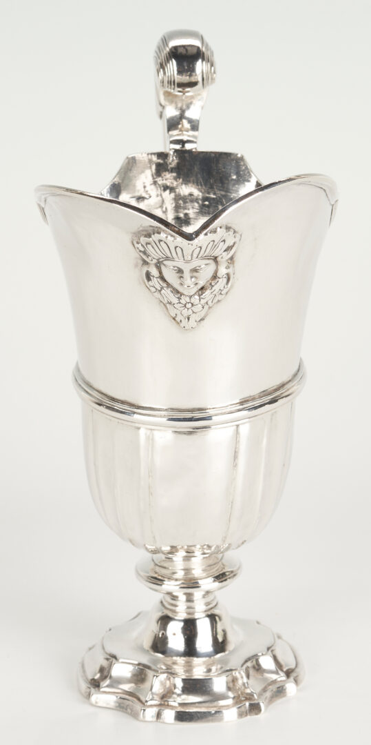 Lot 802: Small Sterling Pitcher with Mask, possibly S. American