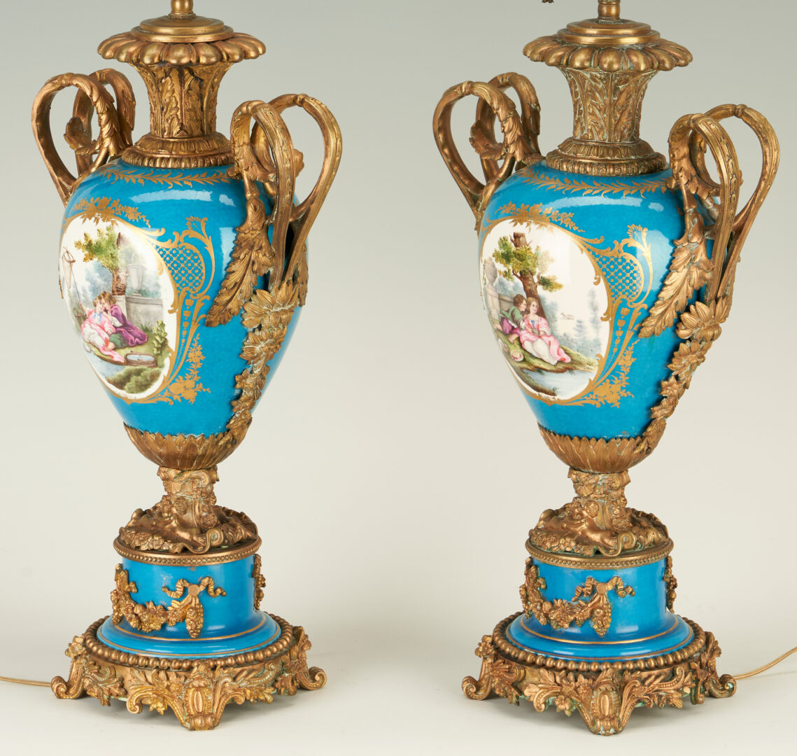 Lot 909: Pr. Sevres Style Bleu Celeste Porcelain Lamps, Ormolu mounts