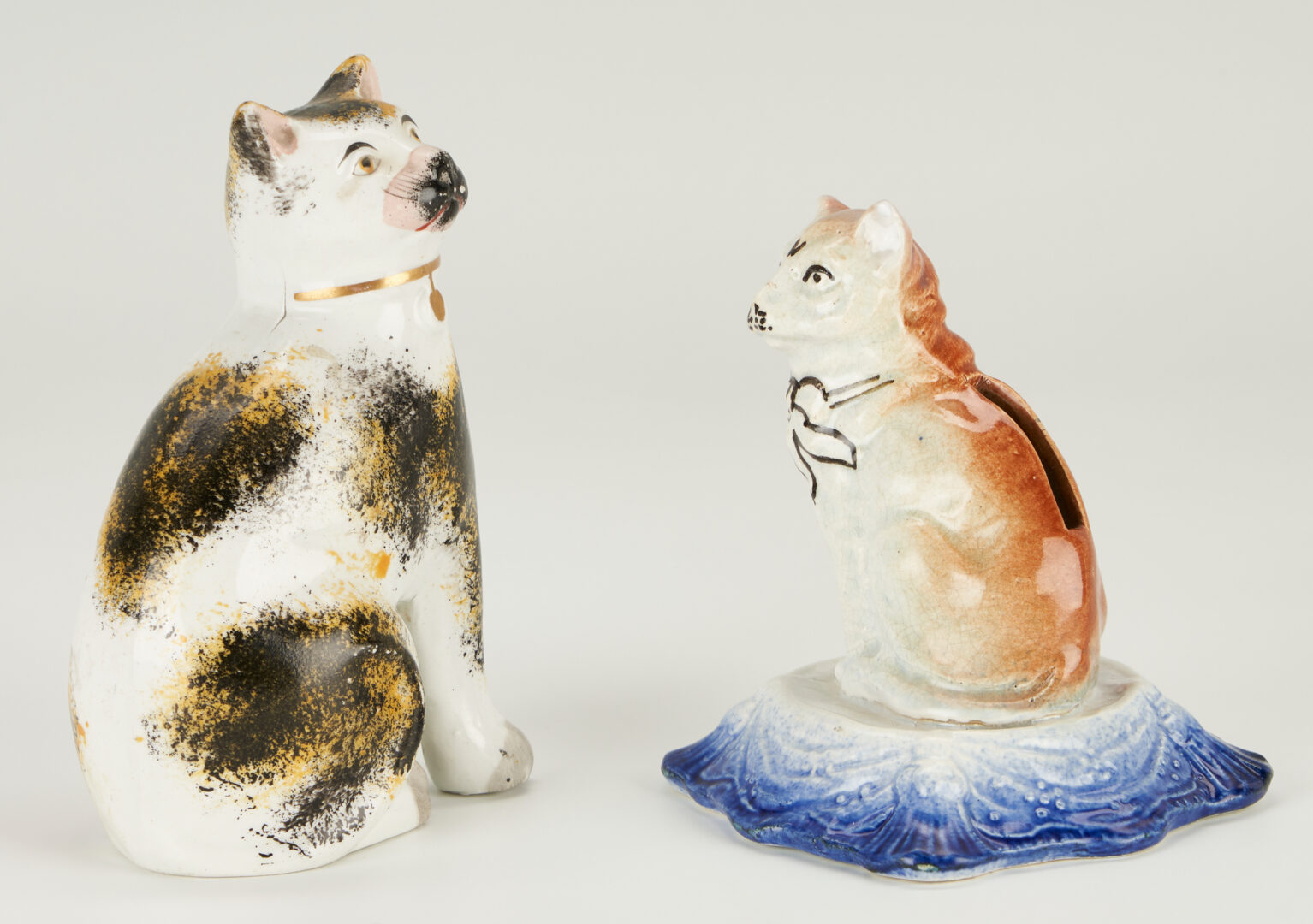 Lot 926: 4 Pearlware & Staffordshire Figures, incl. Cat, Bank, Toby Lamp Lighter