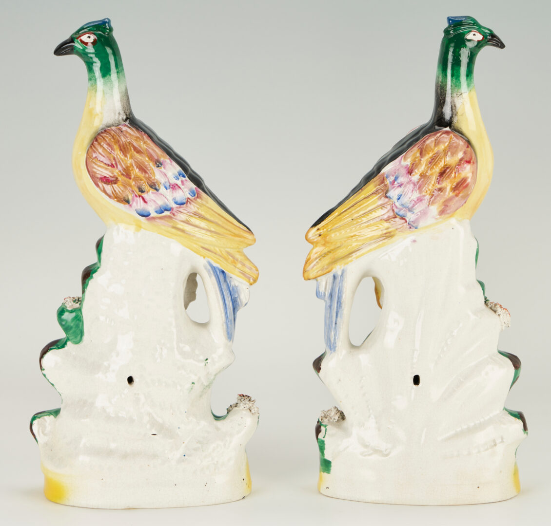 Lot 928: Pair of Staffordshire Bird Figurines