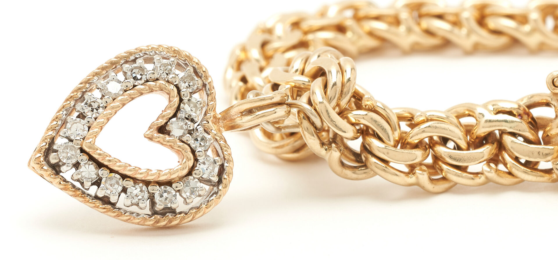 Lot 980: 14K Diamond Charm Bracelet
