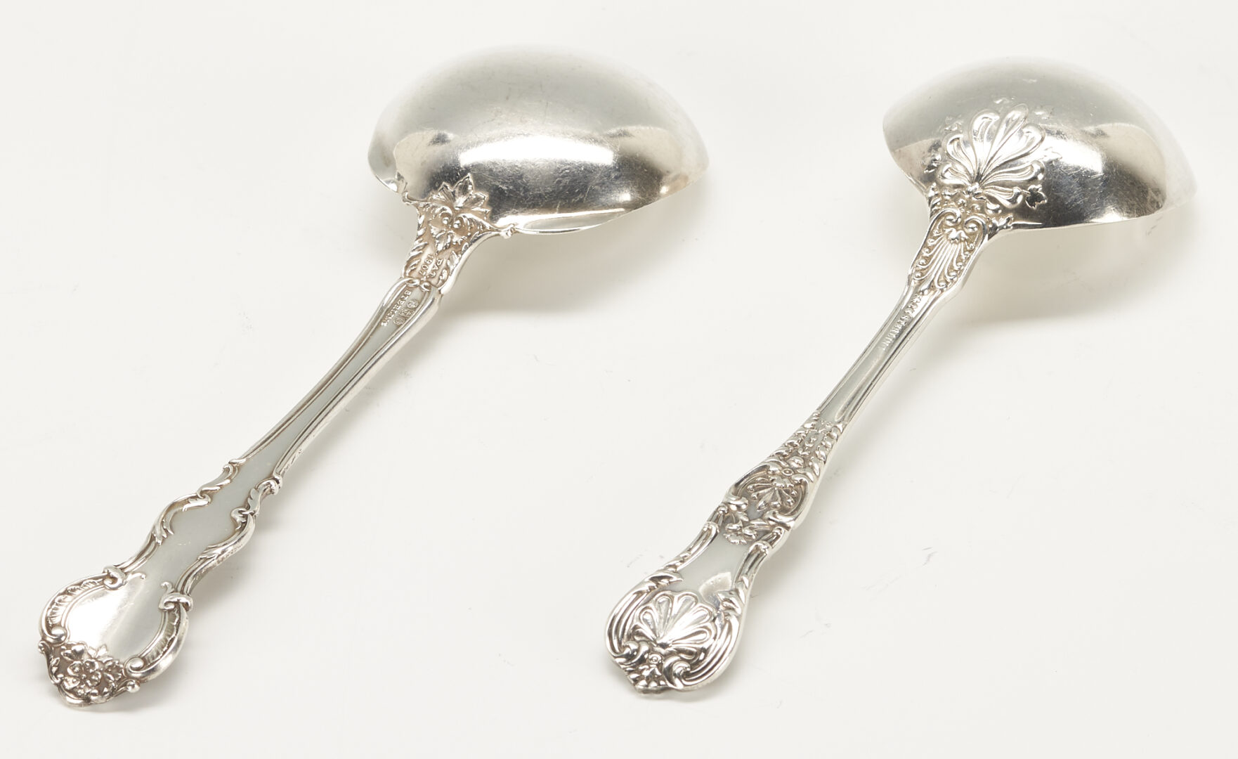 Lot 1096: 17 Sterling Silver Items, Gorham Soup Spoons & Howard Repousse Bowl